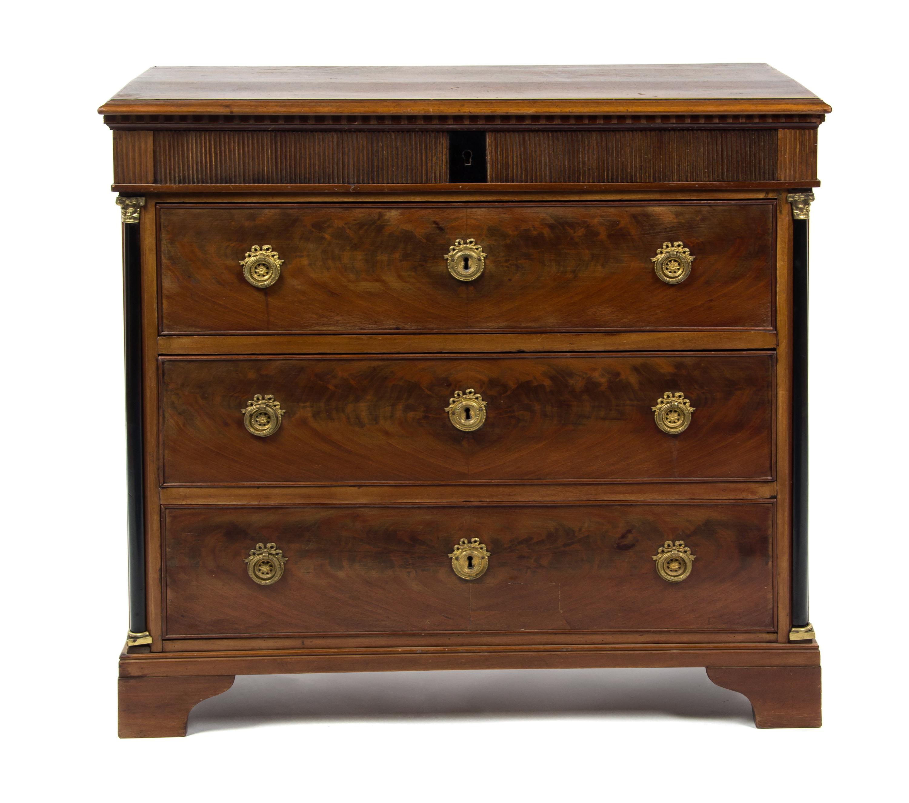 An Empire Style Mahogany Commode, Height 32 x width 35 x depth 19 1/4 inches.