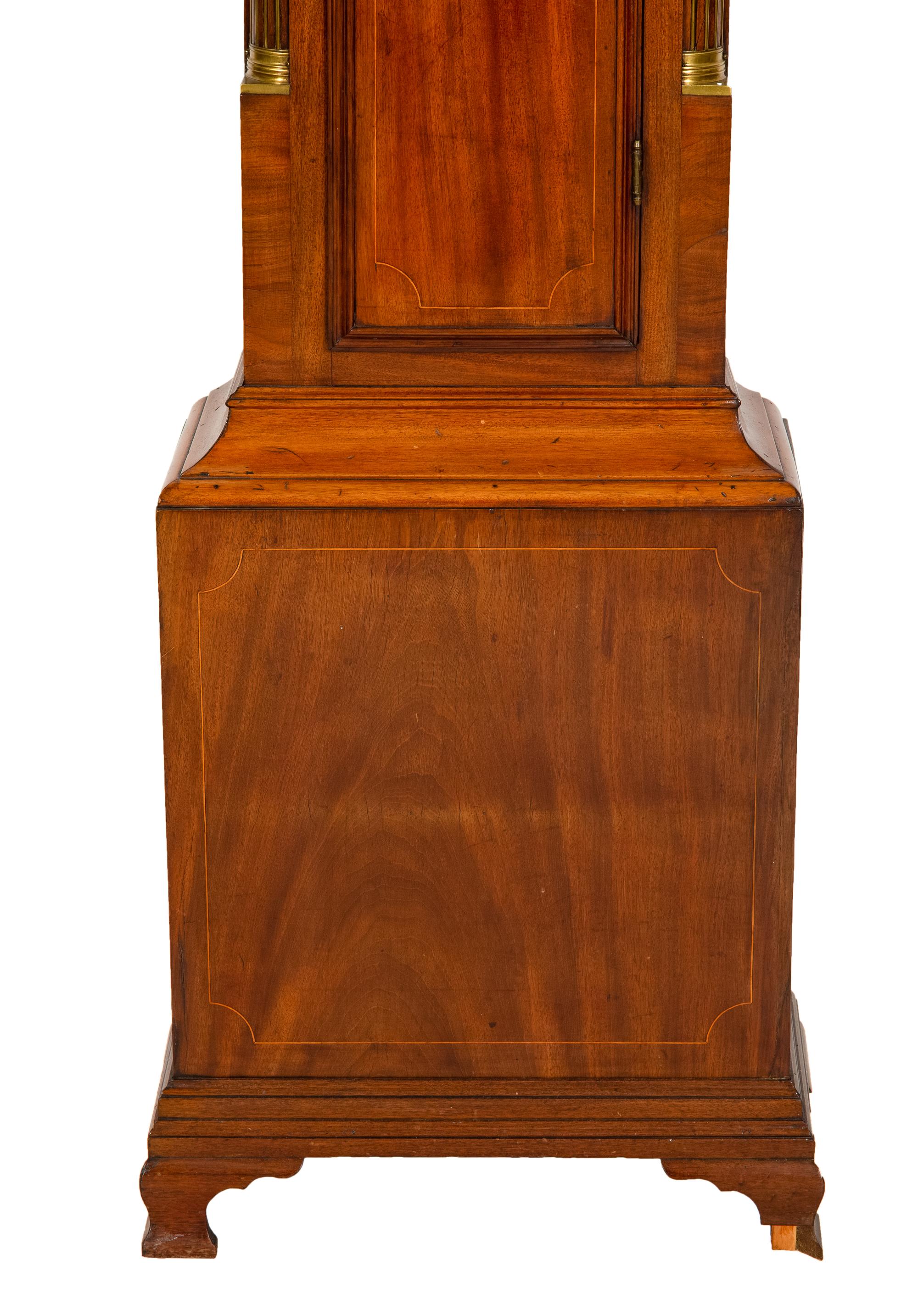 An American Mahogany Brass-Mounted, Inlaid and Carved Mahogany Tall Case Clock