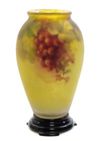 A Reverse Painted Glass Vase, Ambero, CIRCA 1915-1916, of ovoid form with grape decoration, signed, having a separate glass base
