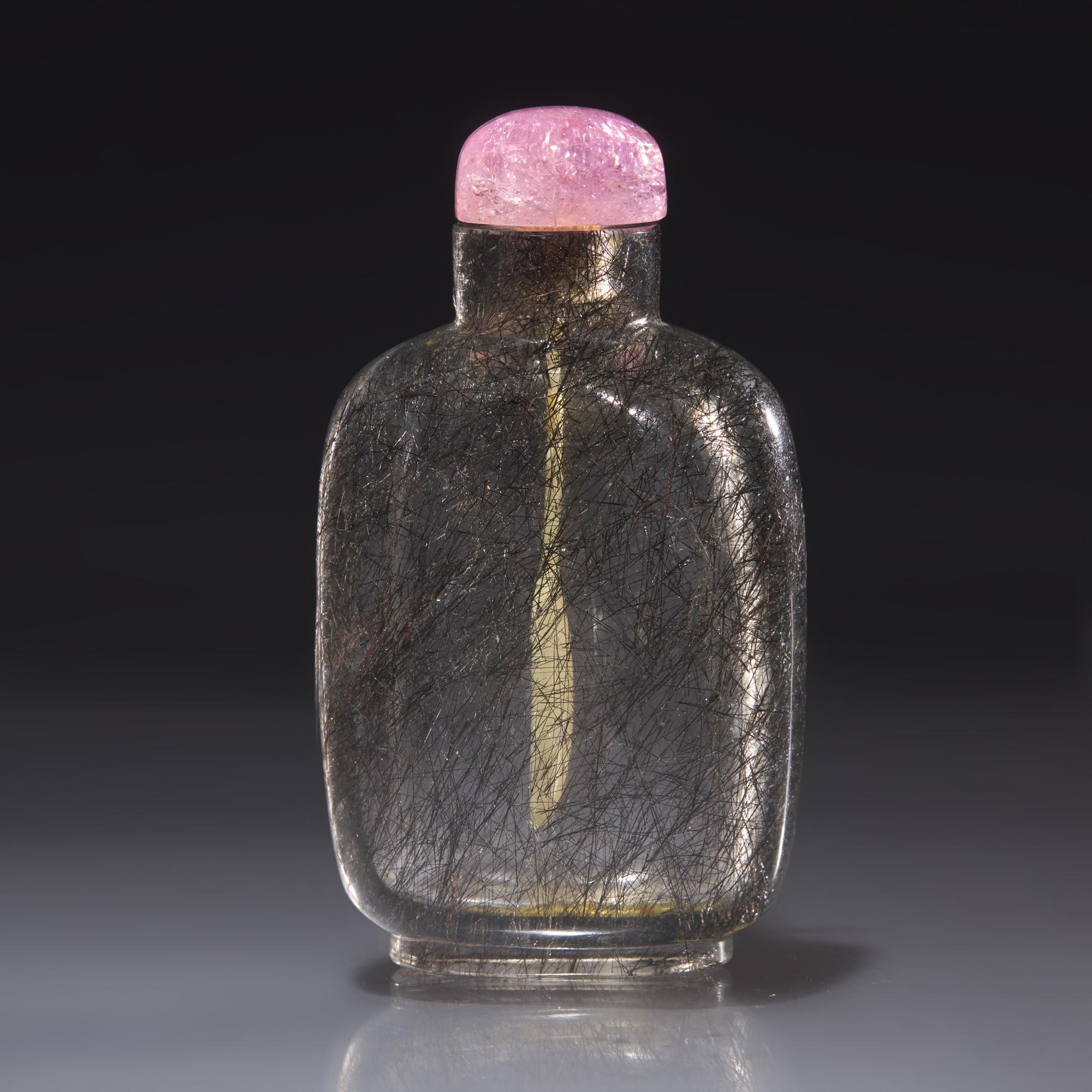 A Chinese "Hair Crystal" Snuff Bottle, Qing Dynasty, Circa 1740-1850 — 1740–1850年 髮晶素面鼻煙壺