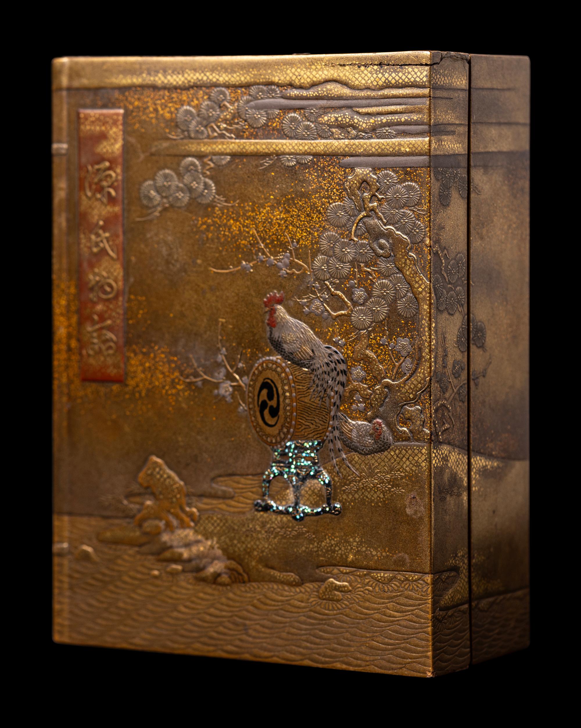 A Fine Japanese Gold, Red and Black Lacquer Book-Form Covered Box