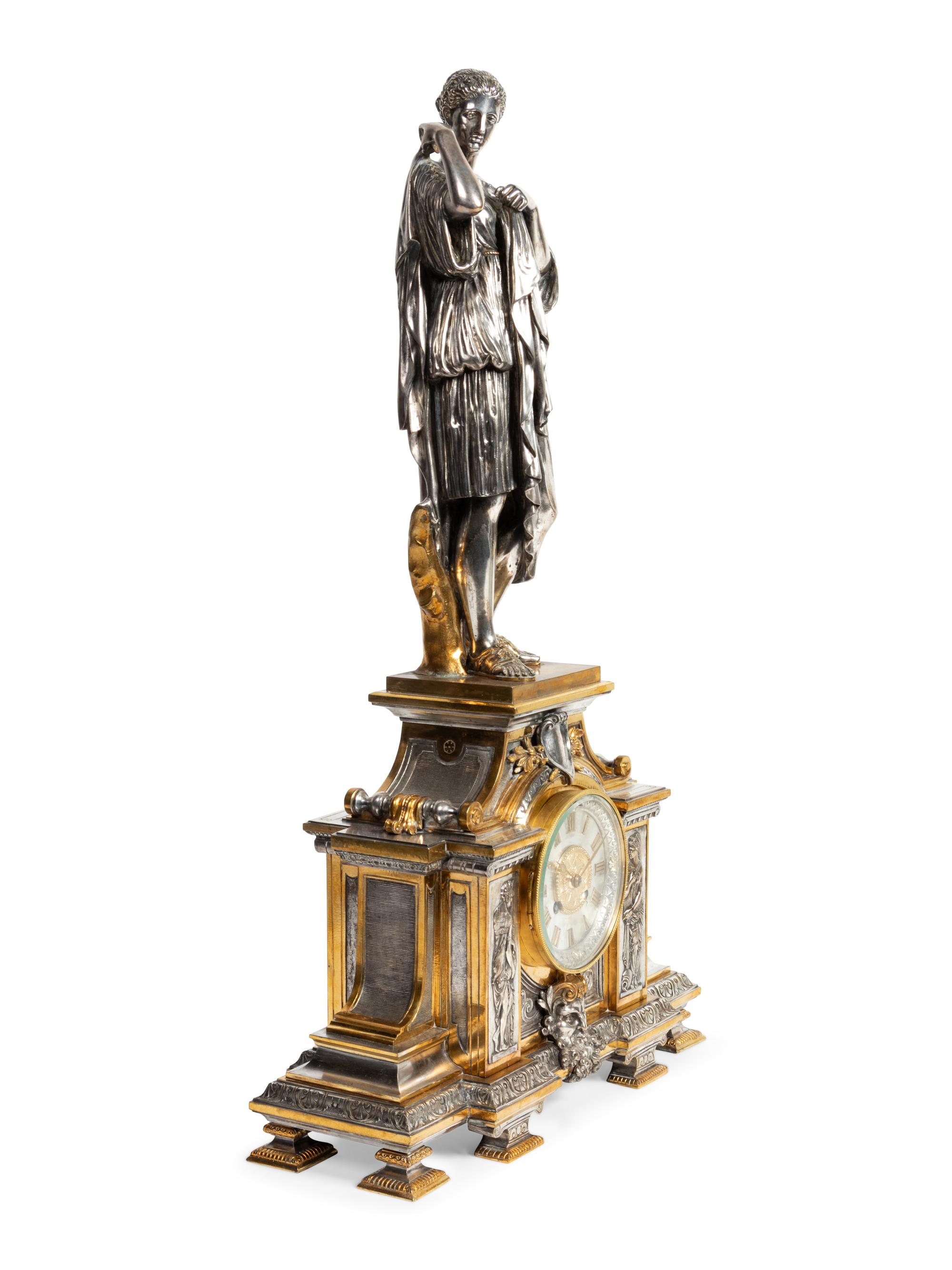 A French Gilt and Silvered Bronze Figural Mantel Clock