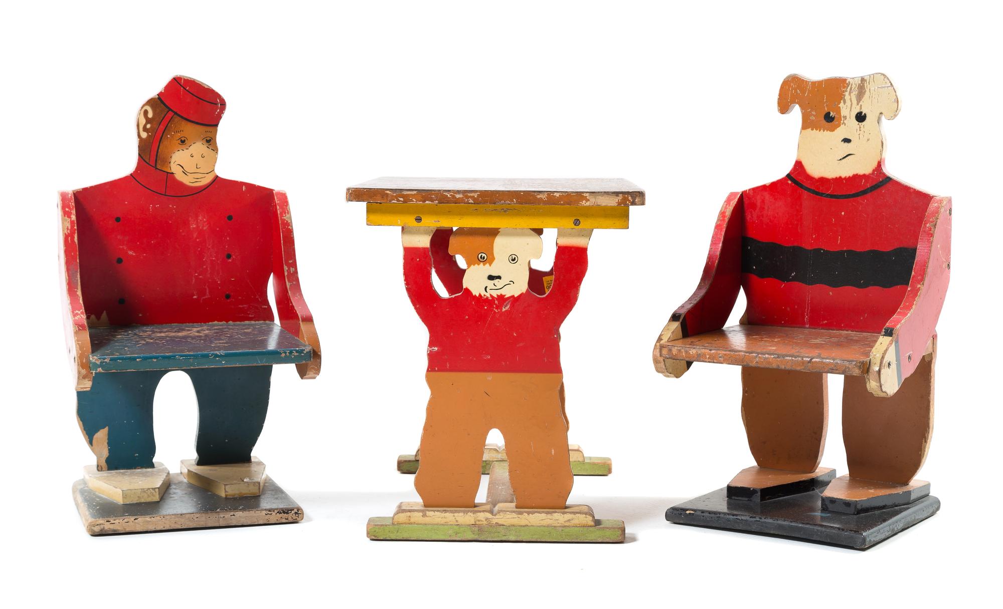 A Folk Art Polychrome Decorated Child's Table and Two Chairs Height of chairs 25 3/4 inches. — Mid 20th Century