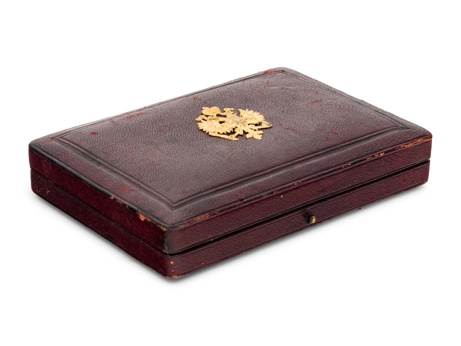 A Large Russian Enameled Silver and Guilloché Enamel Cigarette Case with Gold Accents