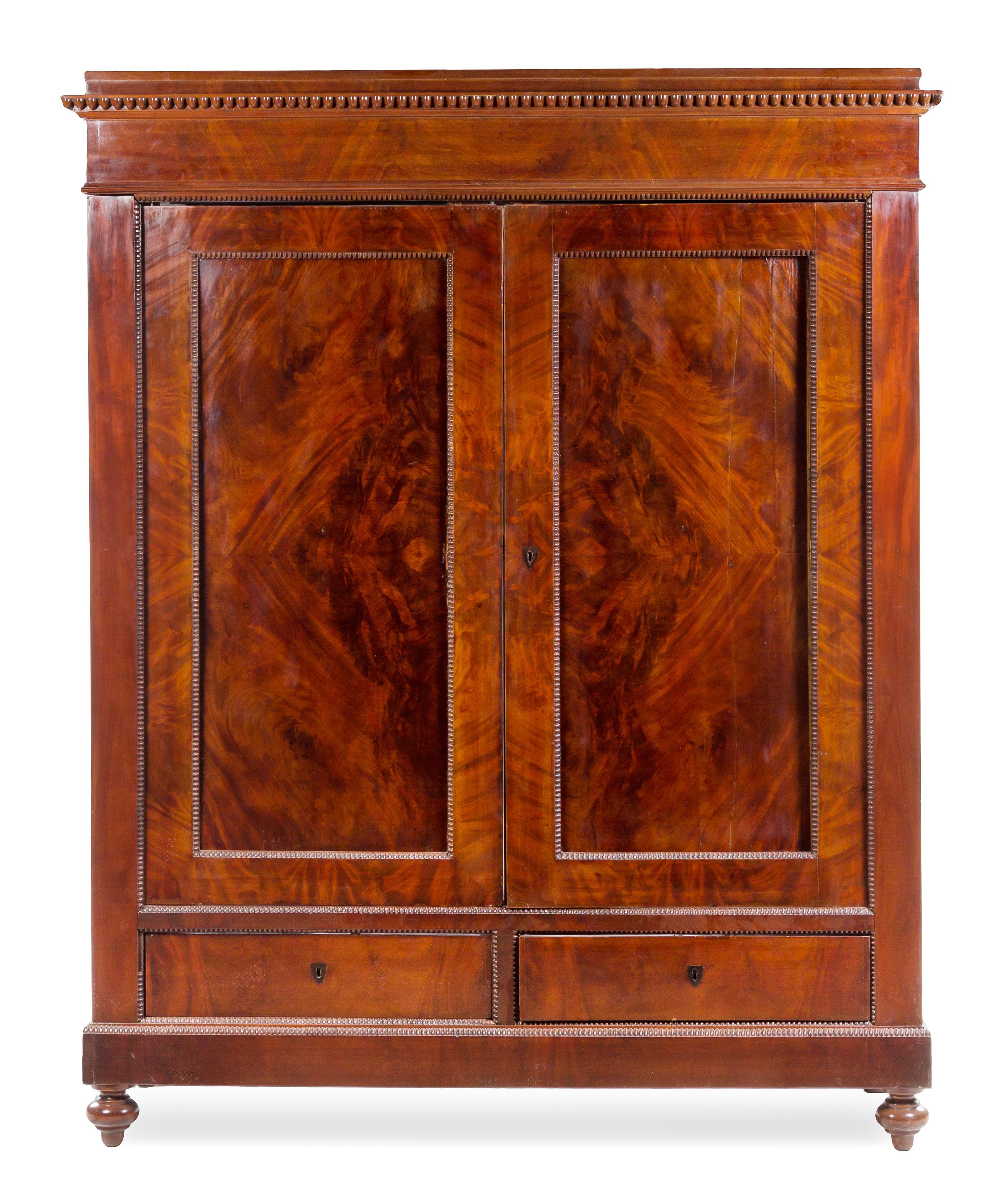A Continental Mahogany Armoire Height 94 1/4 x width 68 3/4 x depth 24 inches. — EARLY 19TH CENTURY