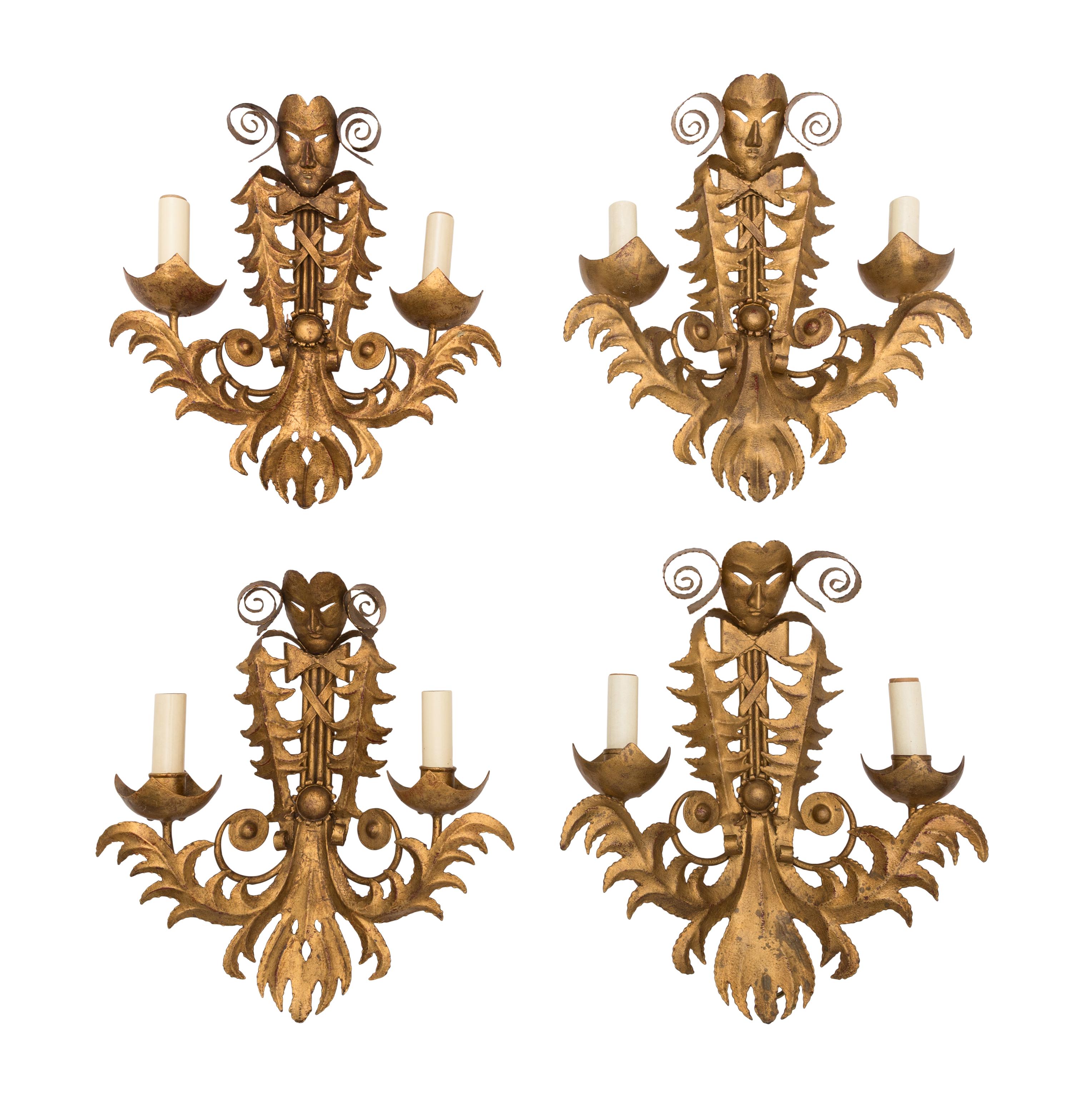 A Set of Four French Gilt Metal Two-Light Sconces