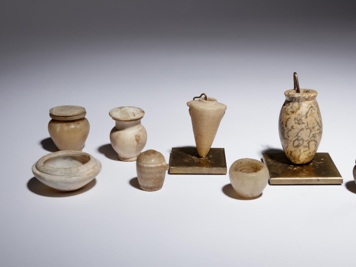 Twelve Egyptian Alabaster, Breccia and Other Stone Vessels