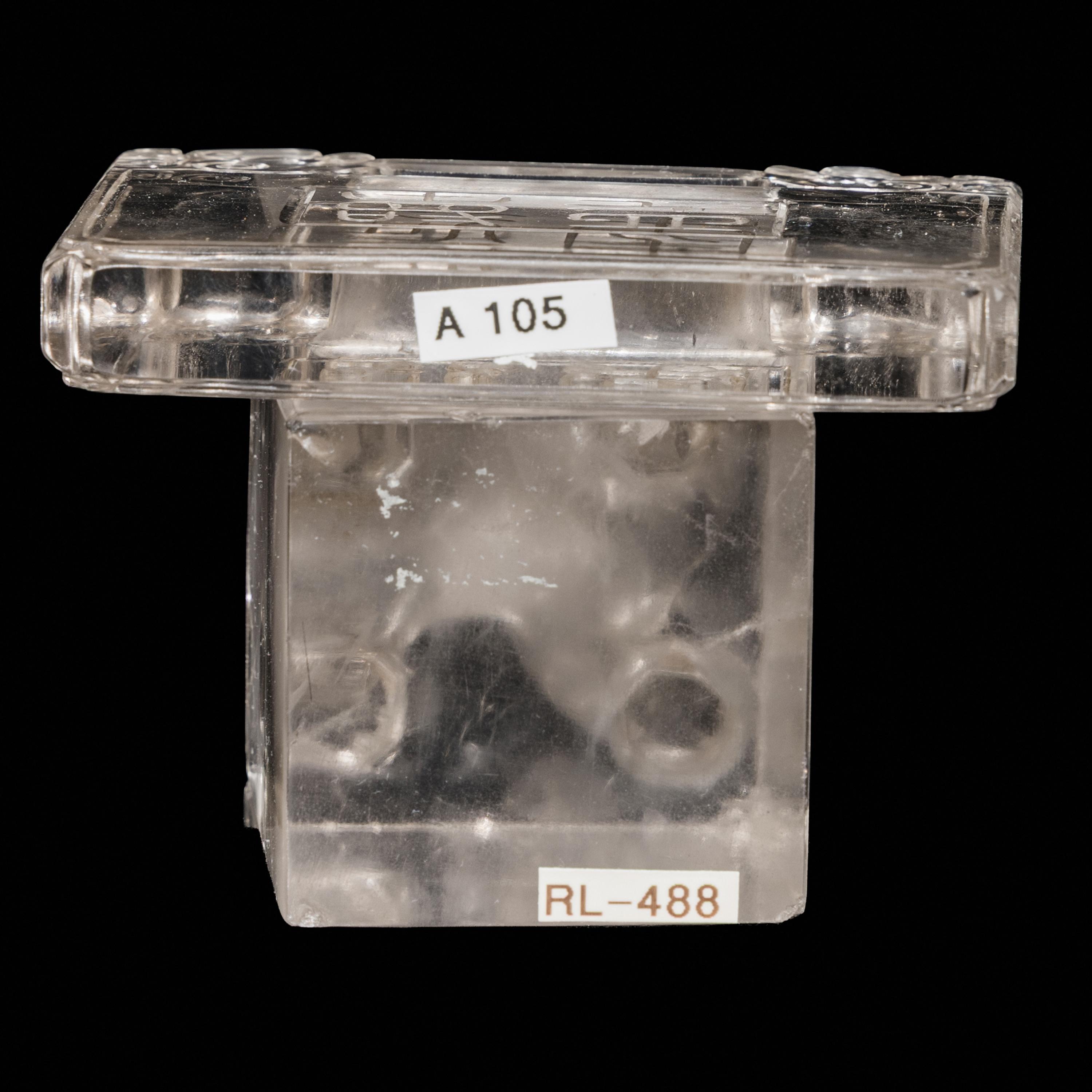 A Chinese Rock Crystal Seal and A Rock Crystal Lock-Form Pendant, 19th-20th Century — 晚清-民國 水晶長命鎖及獅鈕方章