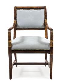 A Continental Parcel Gilt Armchair Height 37 3/4 inches. — 19TH CENTURY