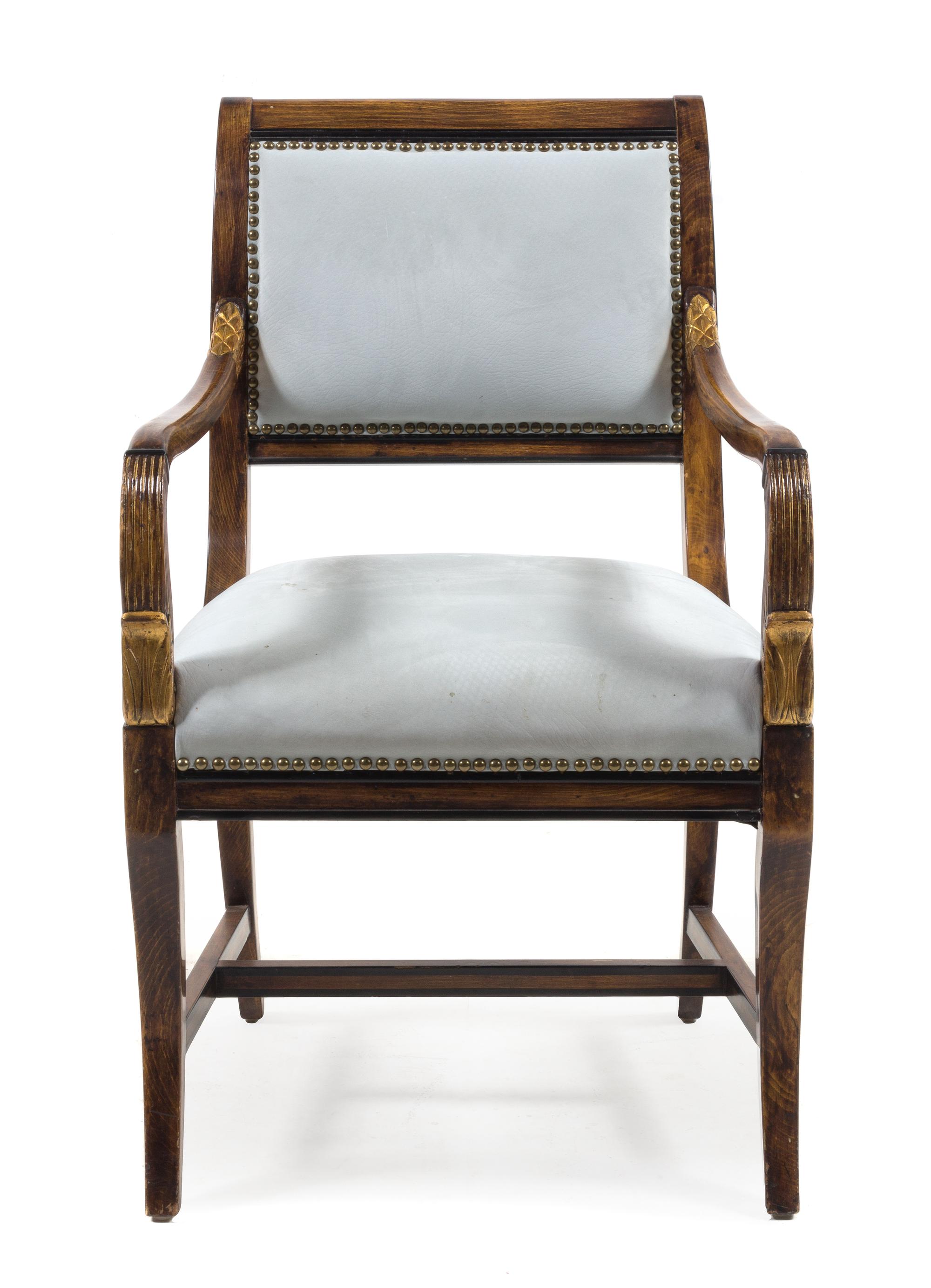 A Continental Parcel Gilt Armchair Height 37 3/4 inches. — 19TH CENTURY