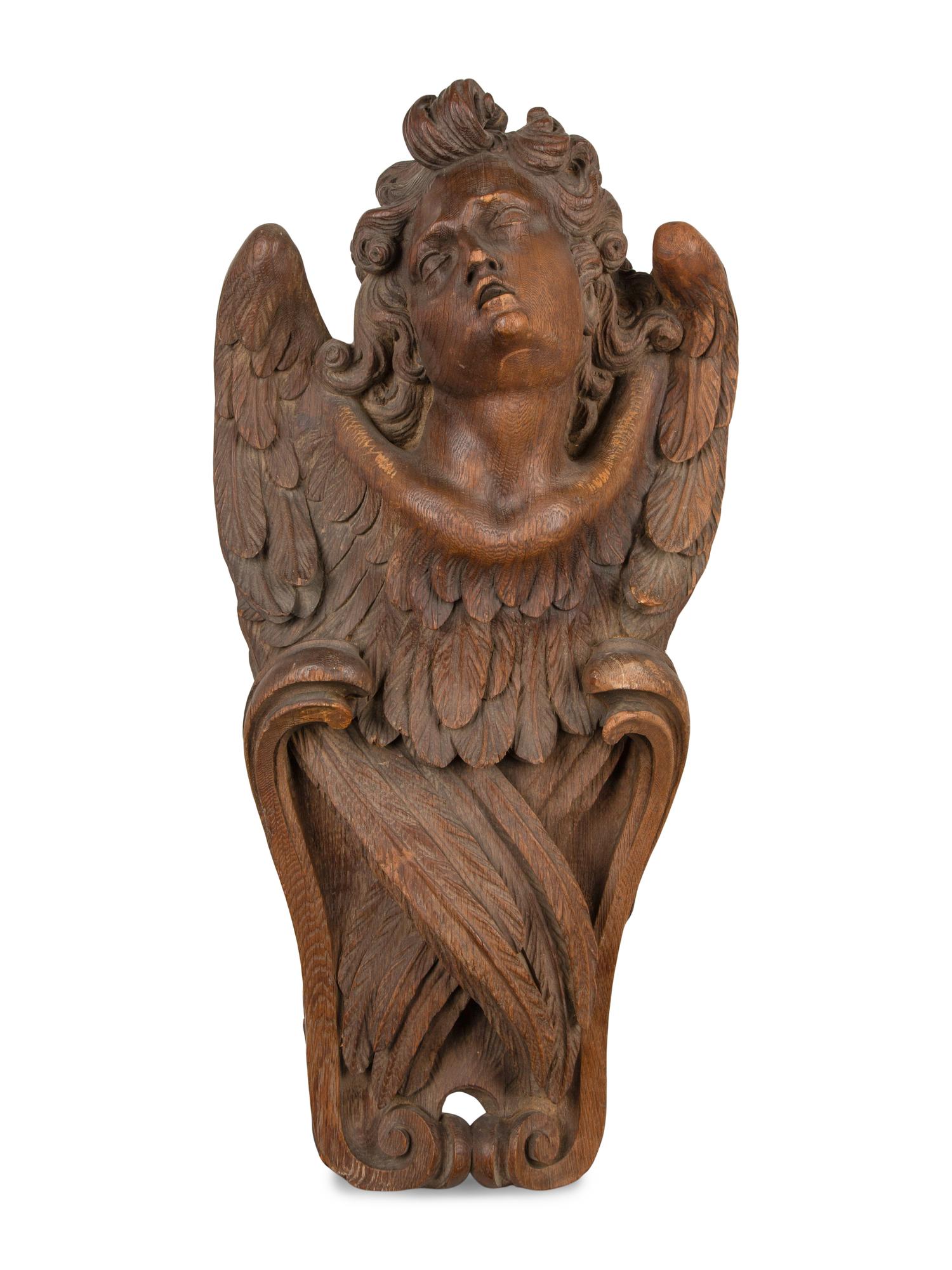 A Pair of Continental Oak Figural Pilasters — 17TH CENTURY