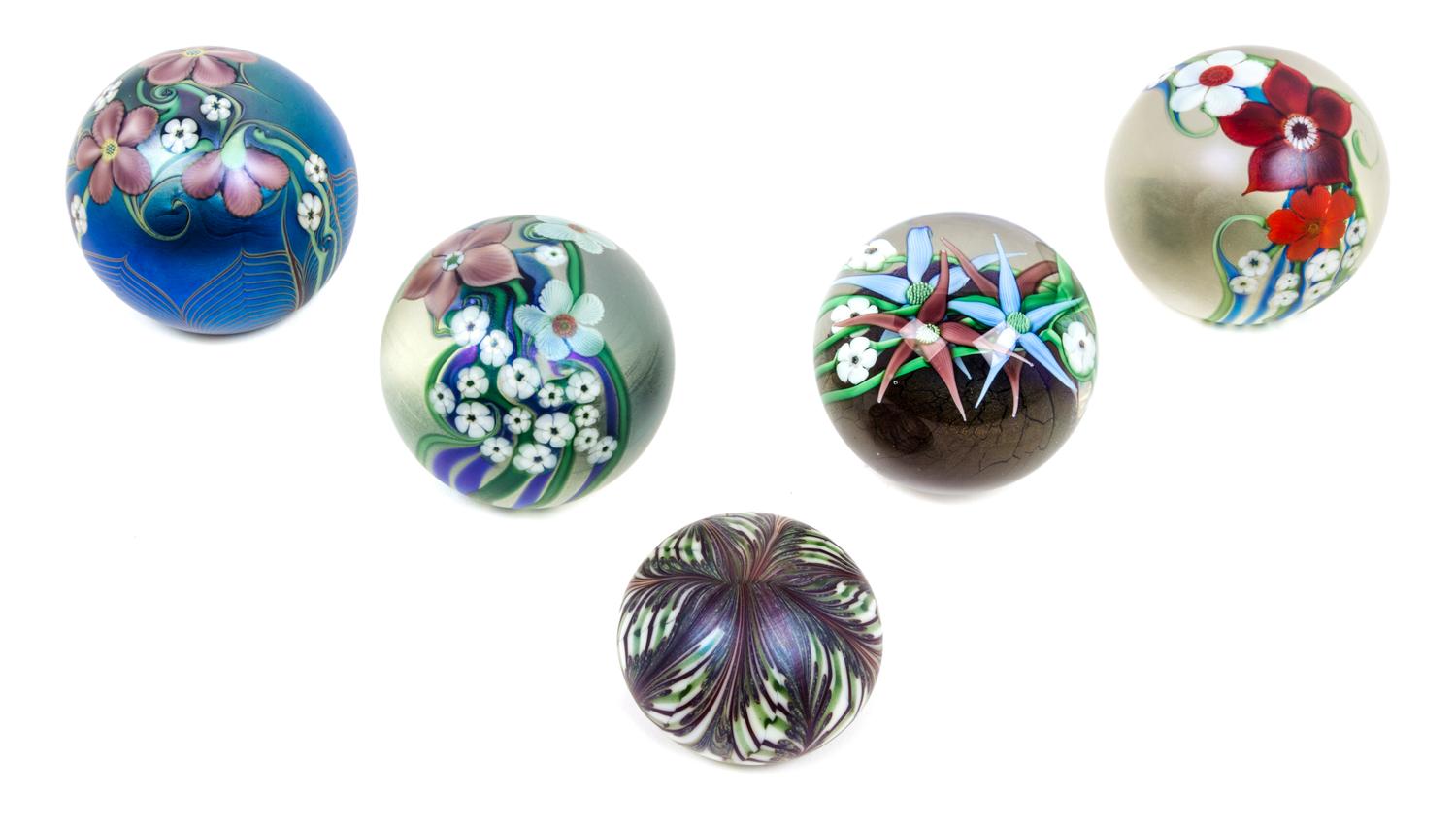 A Collection of American Studio Glass Paperweights, Orient & Flume Diameter of largest 3 inches.