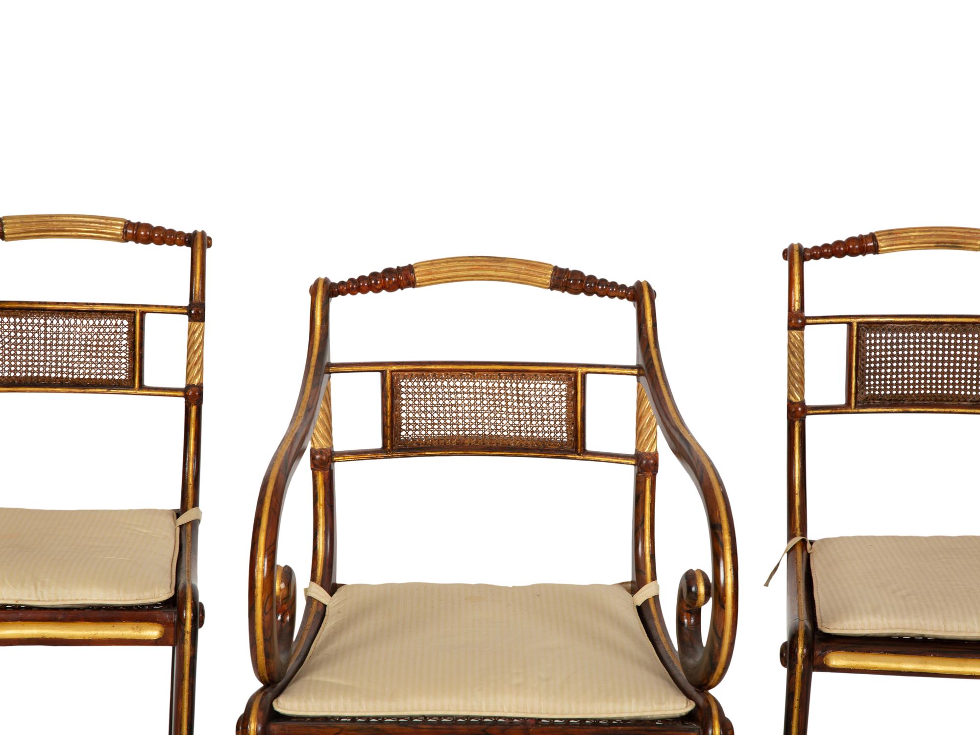 A Set of Fourteen Regency and Regency Style Rosewood and Parcel Gilt Dining Chairs