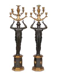 A Pair of Empire Style Gilt and Patinated Bronze Six-Light Figural Candelabra