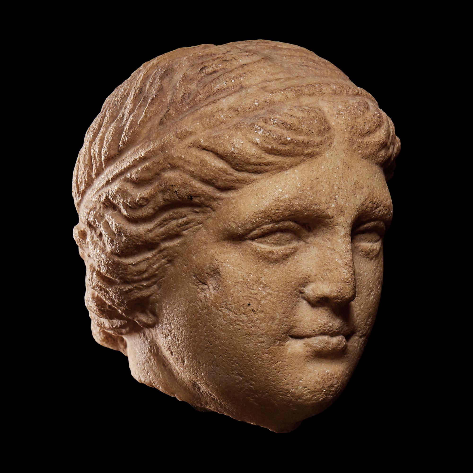A Roman Marble Portrait Head of a Woman