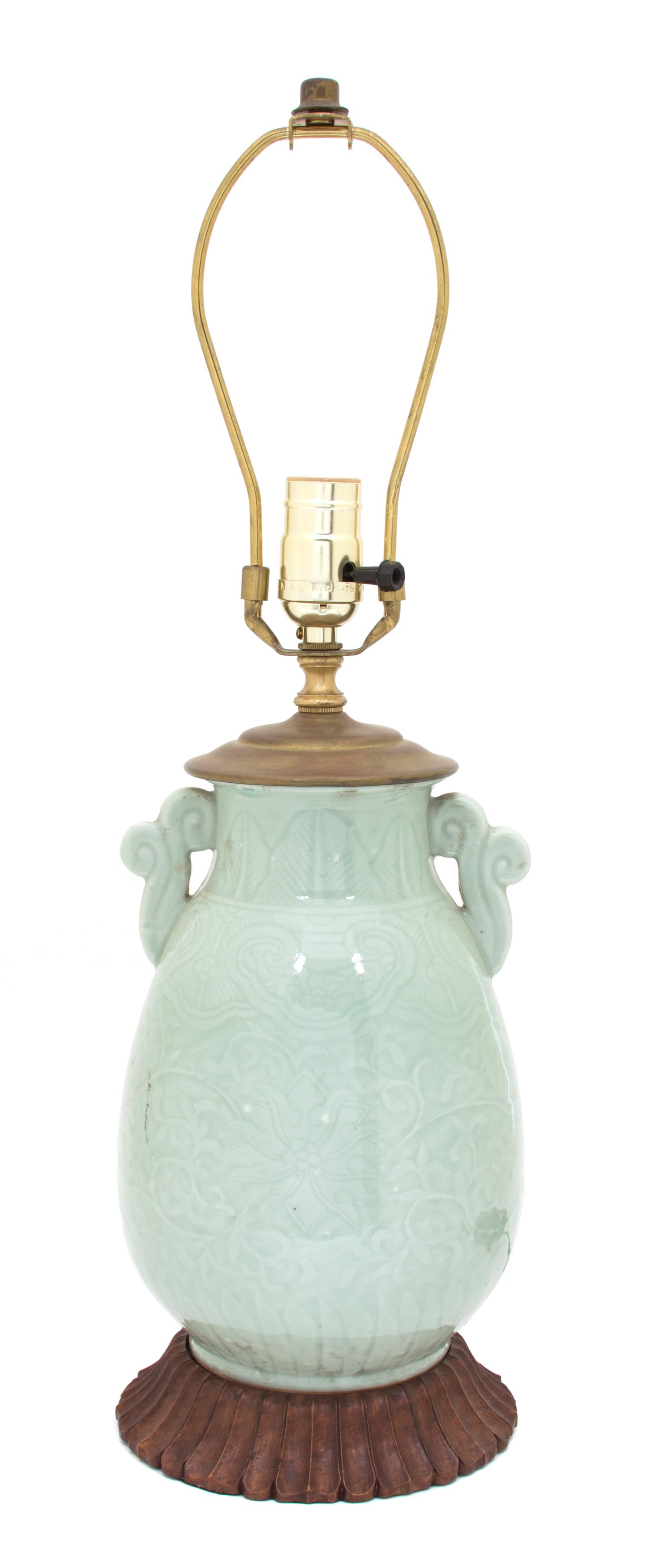A Chinese Celadon Glazed Porcelain Table Lamp Height 22 1/2 inches. — 20TH CENTURY