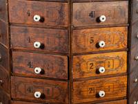 An American Bolt and Screw Case Company Stenciled Pine Octagonal Rotating Cabinet