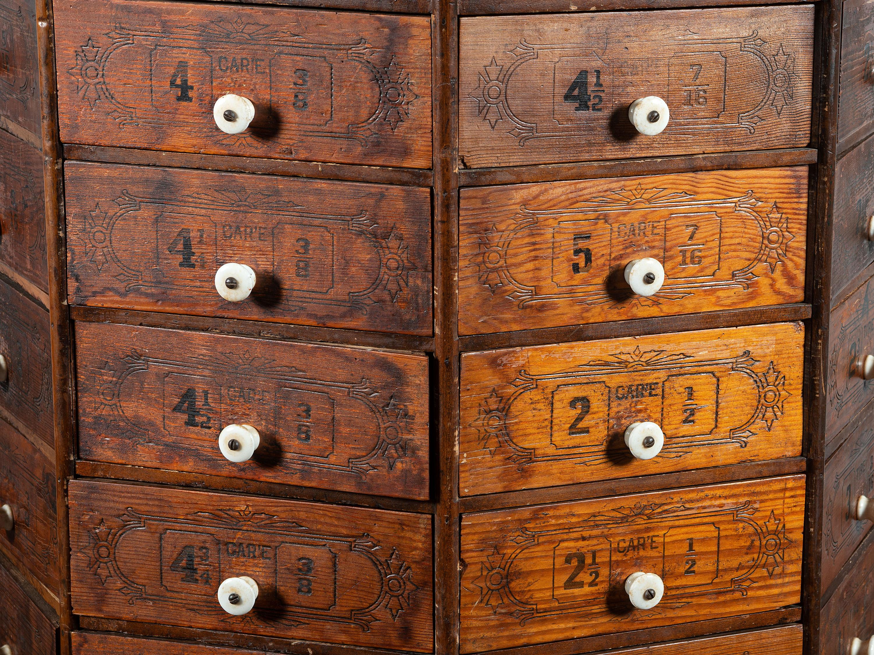 An American Bolt and Screw Case Company Stenciled Pine Octagonal Rotating Cabinet
