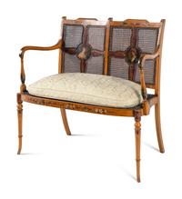 An Edwardian Painted Satinwood Settee