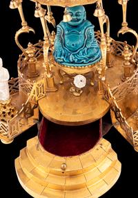 A Louis XV Style Gilt Bronze and Chinese Porcelain Mounted Pagoda-Form Mantel Clock