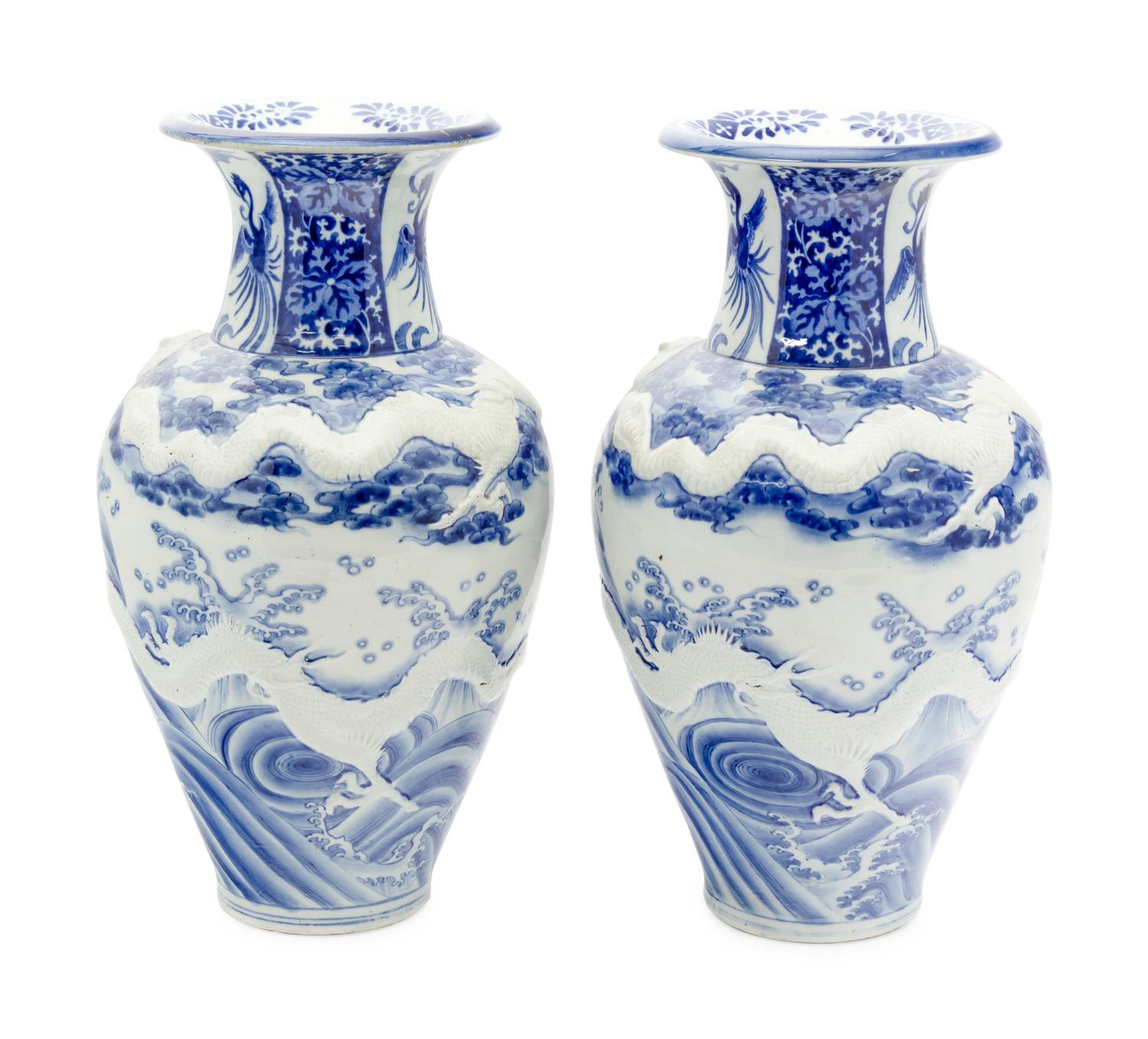 A Pair of Large Japanese Blue and White Porcelain 'Dragon' Baluster Vases