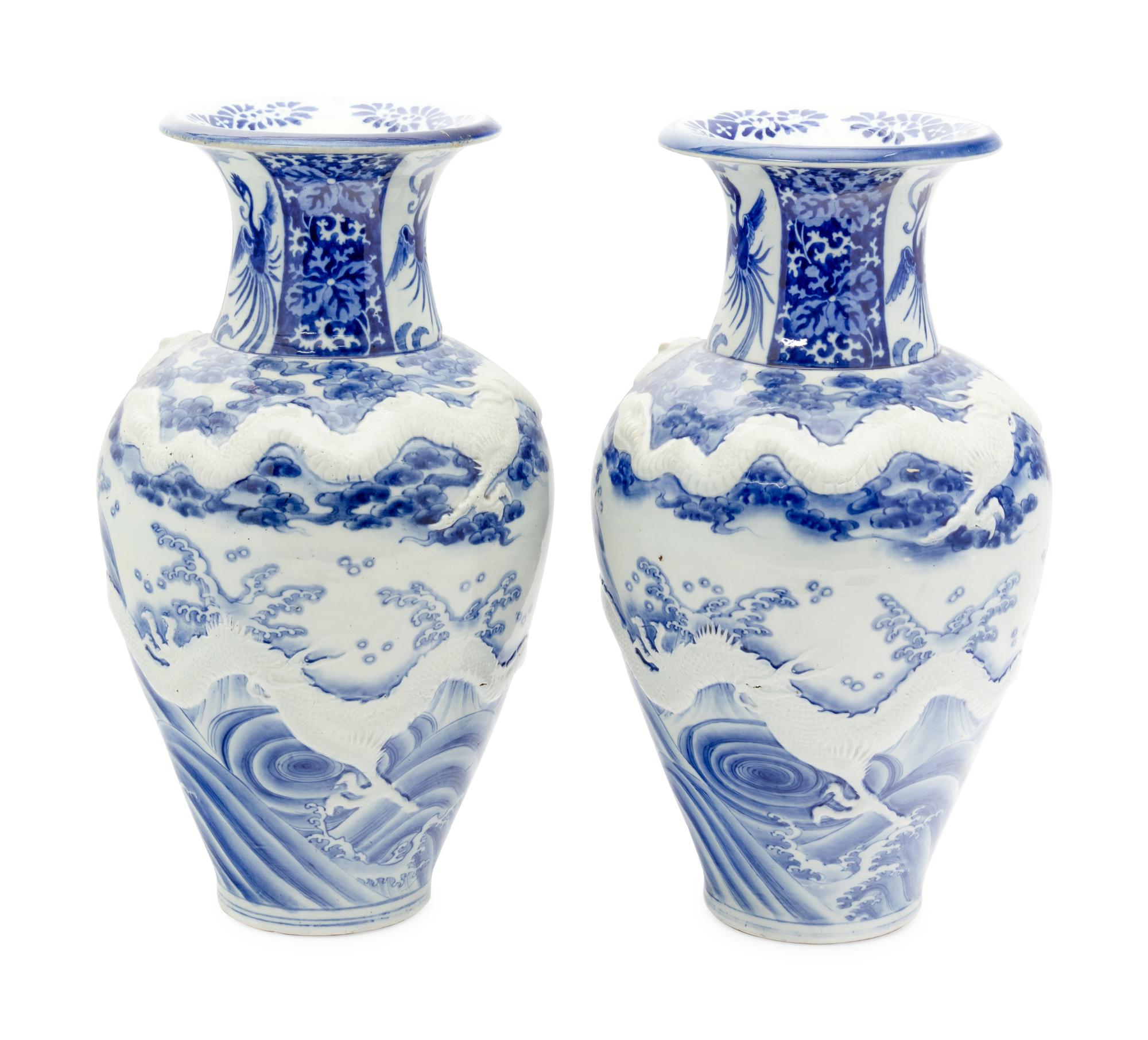 A Pair of Large Japanese Blue and White Porcelain 'Dragon' Baluster Vases