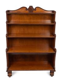 A George IV Carved Mahogany Waterfall Bookshelf In the Manner of Gillows — 19TH CENTURY