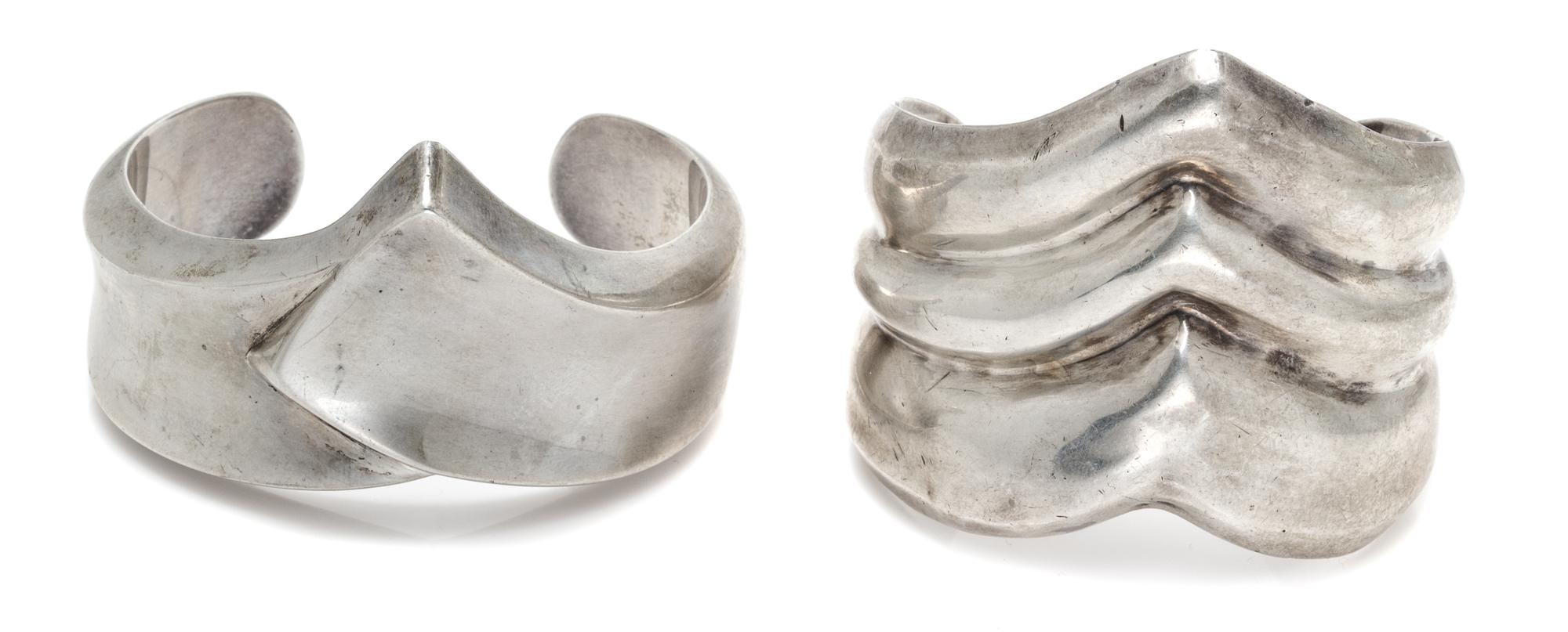 A Collection of Sterling Silver Cuff Bracelets, 148.30 dwts.