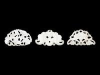 Three Chinese Pale Celadon Jade Reticulated Flori-Form Pendants