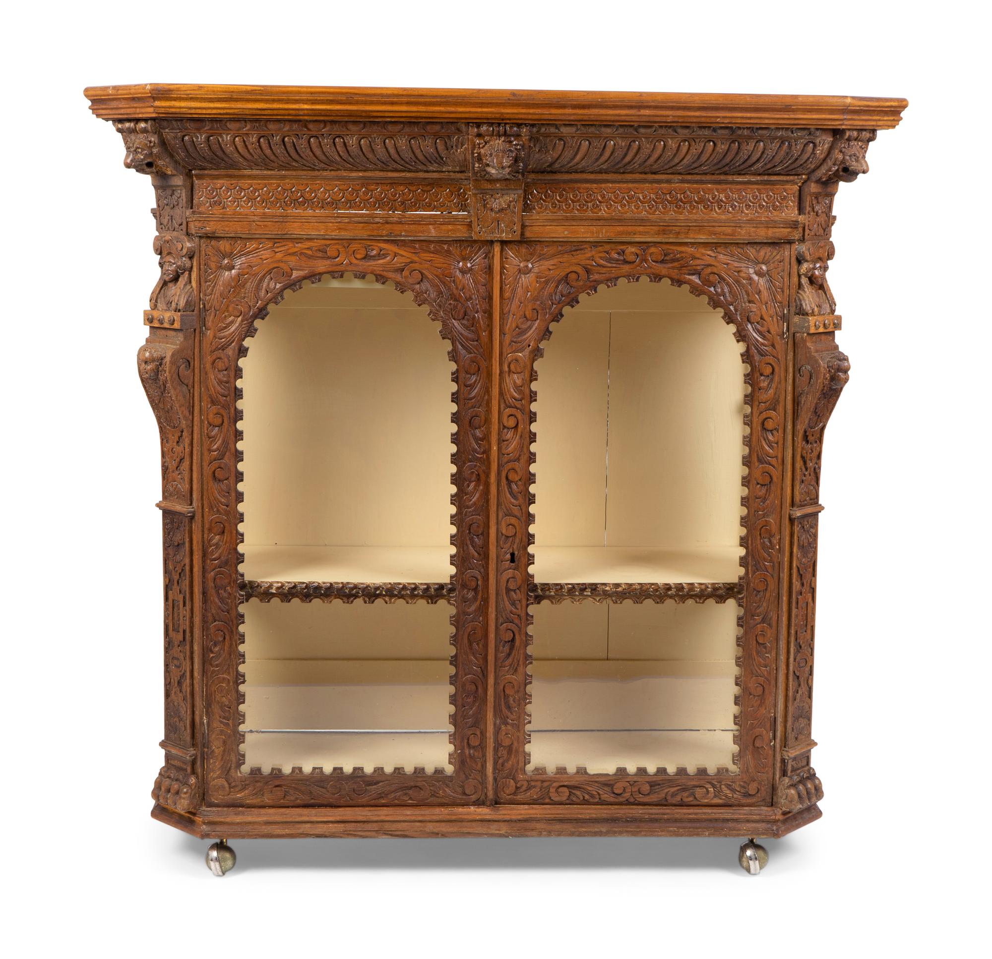 An Anglo-Indian Carved Wood Display Cabinet — 20TH CENTURY