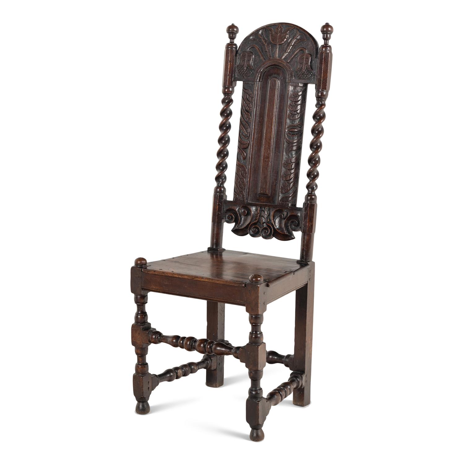 A Matched Pair of Charles II Carved Oak Side Chairs
