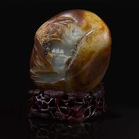 A Chinese russet and pale celadon jade "Mountain" boulder 玉雕山子及底座 Jade late Qing or earlier ????????