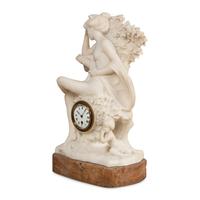 A Carved Marble Figural Mantel Clock
