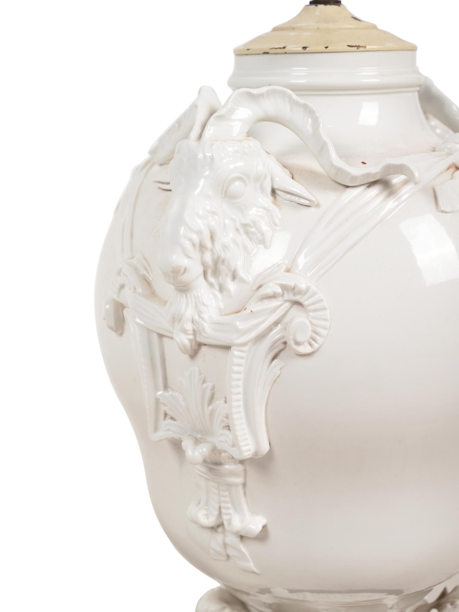 A Pair of German Blanc-de-Chine Porcelain Urns Mounted as Lamps