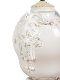 A Pair of German Blanc-de-Chine Porcelain Urns Mounted as Lamps