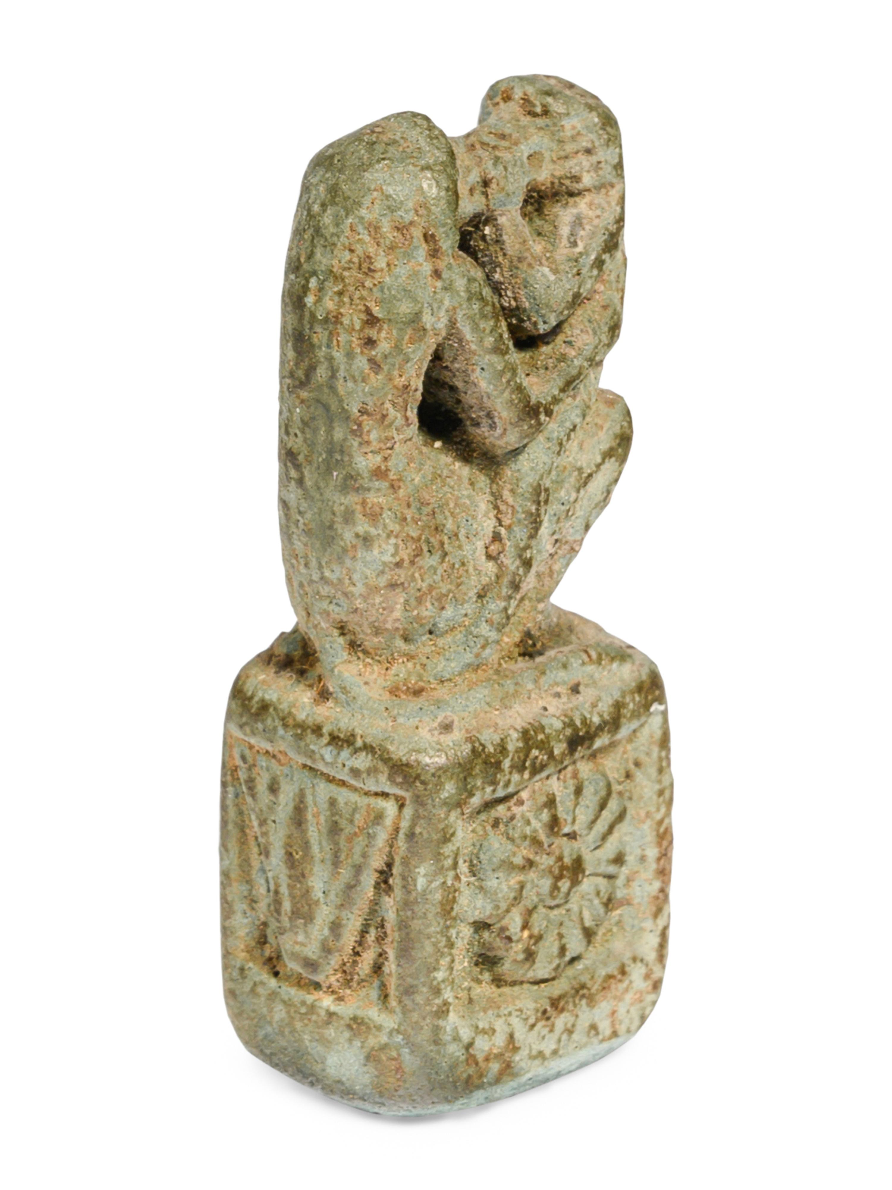 An Egyptian Faience of Kissing Baboons Amulet
