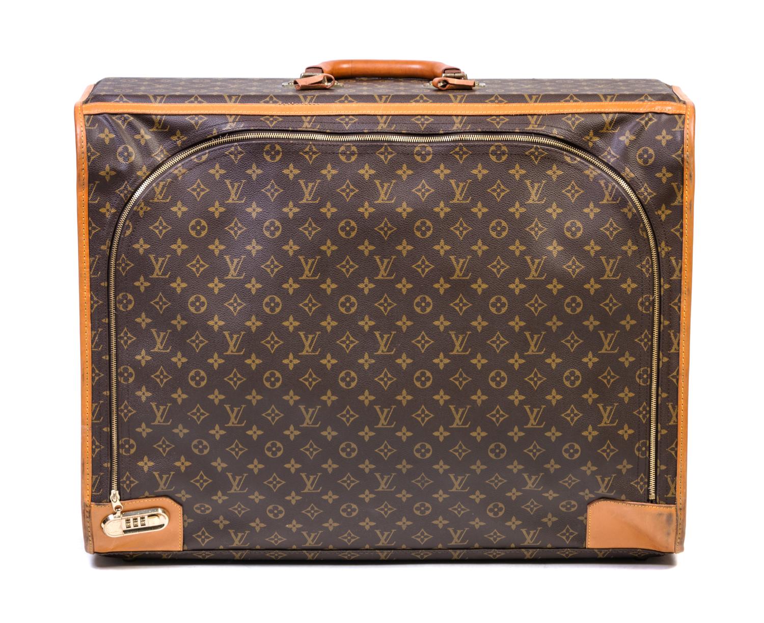 A Louis Vuitton Softsided Suitcase, 25" X 9.5 " x 19".