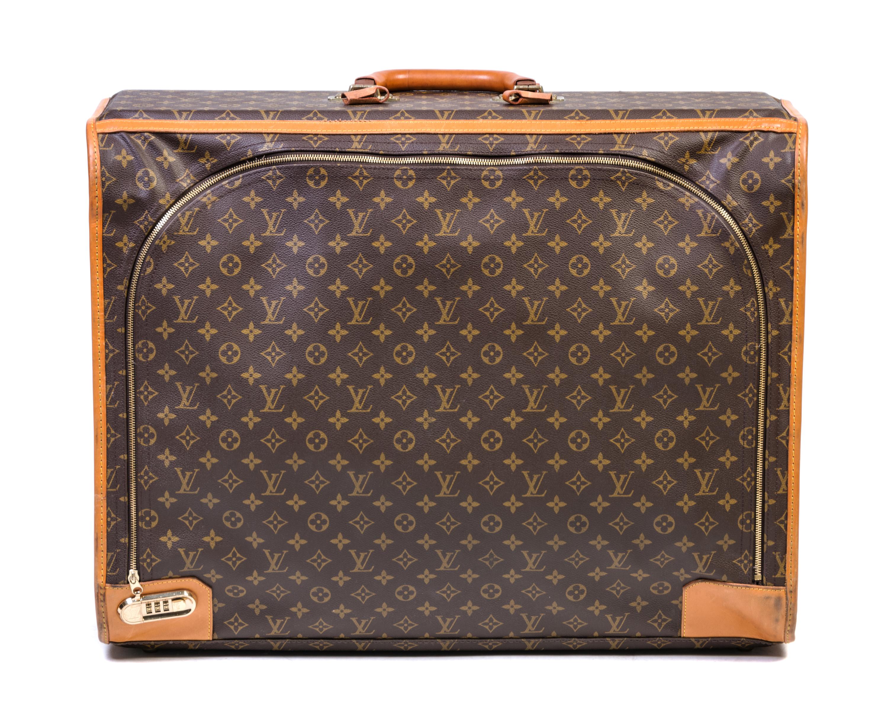 A Louis Vuitton Softsided Suitcase, 25" X 9.5 " x 19".