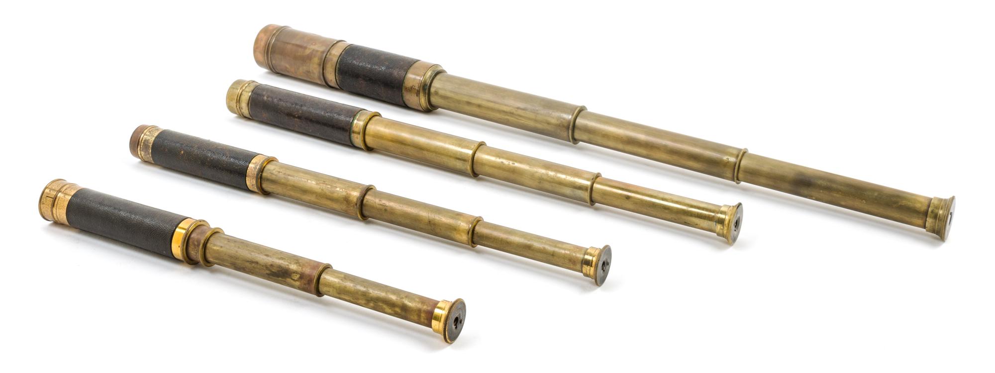 A Group of Four Leather Body Three-Draw Hand Telescopes Length of largest 7 3/4 inches (closed).