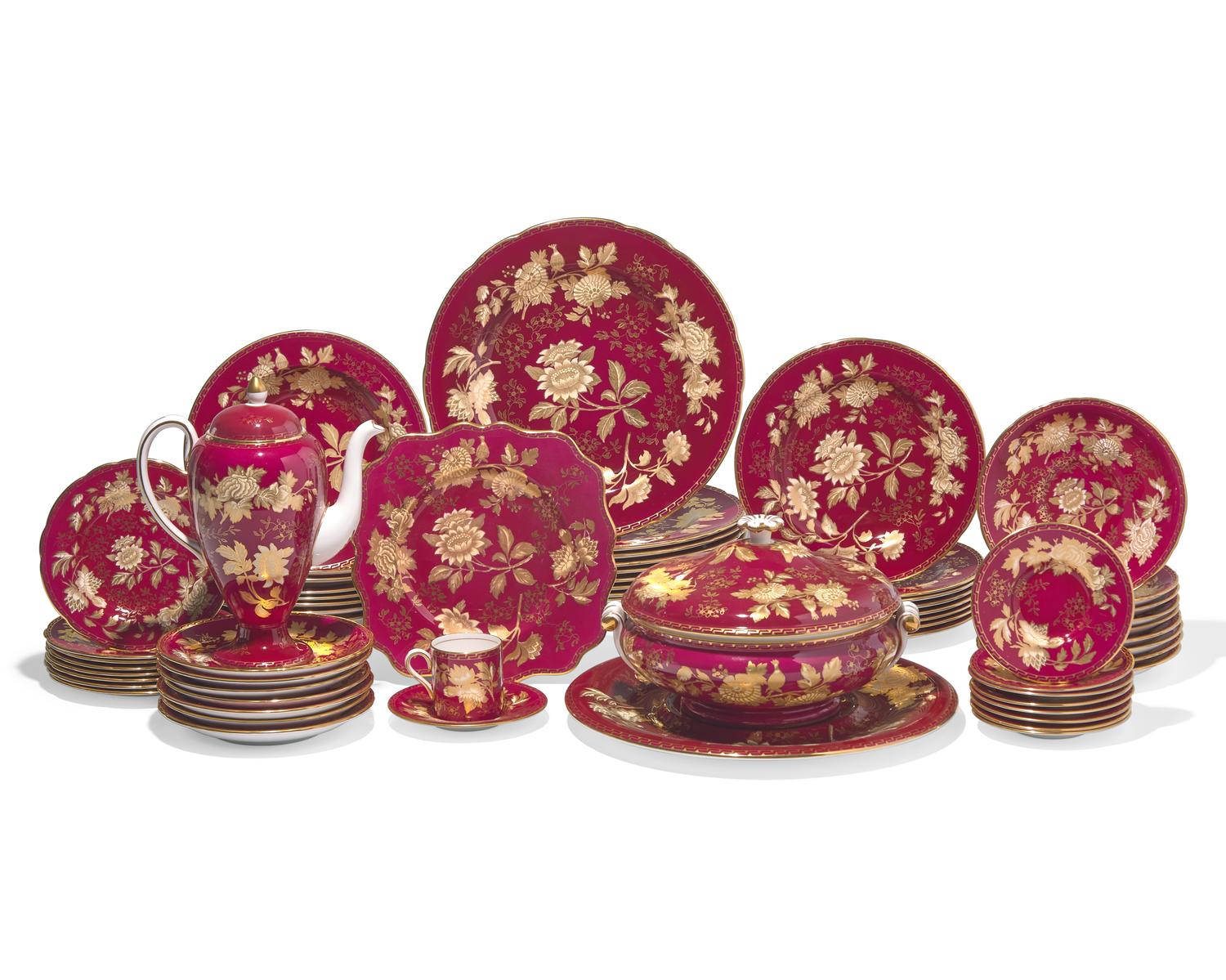 A Wedgwood Parcel Gilt Porcelain Dinner Service