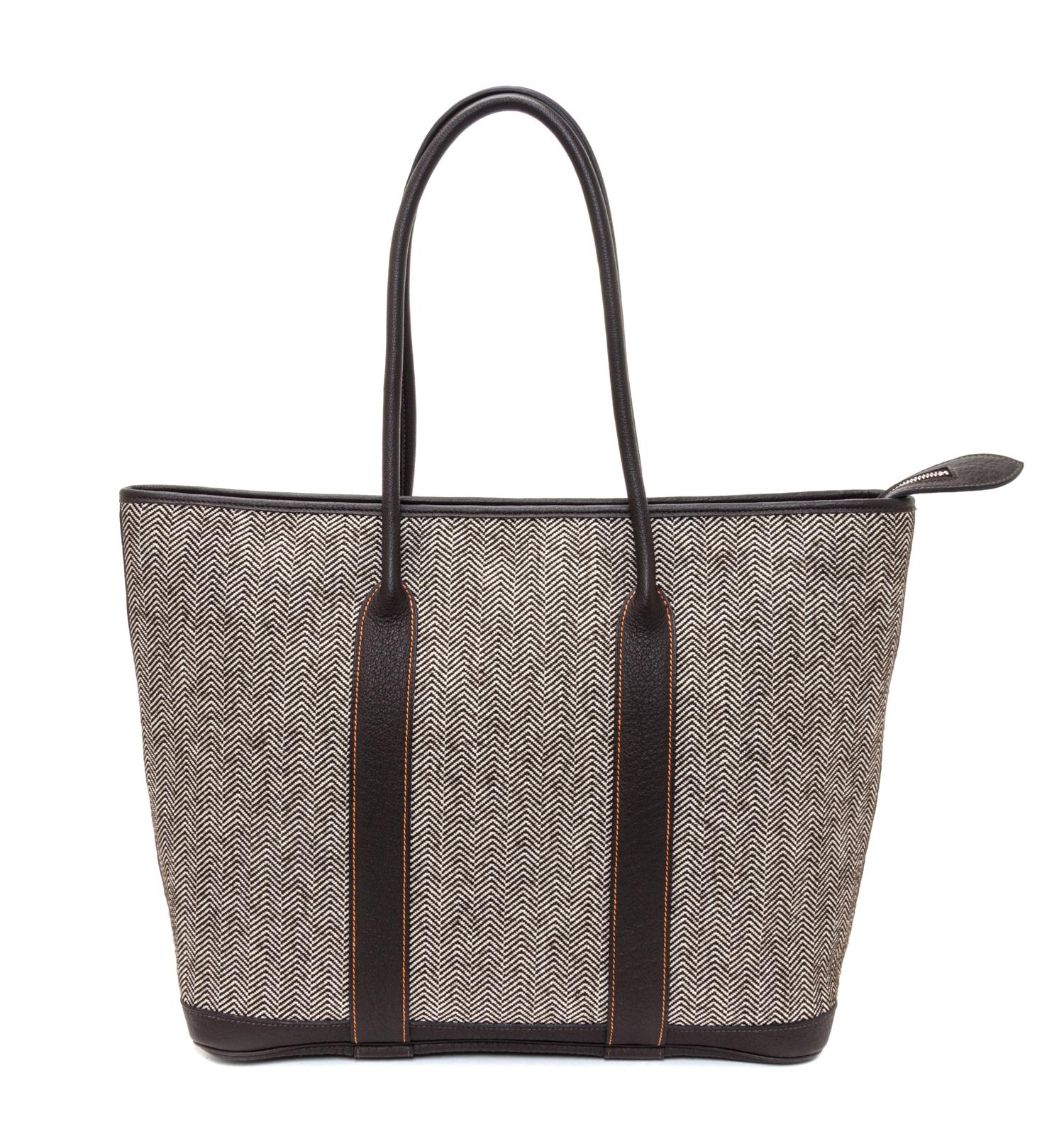 An Hermes Ecru Chevron Tweed and Ebene Leather Tote Bag, 12.5" x 14" x 5".
