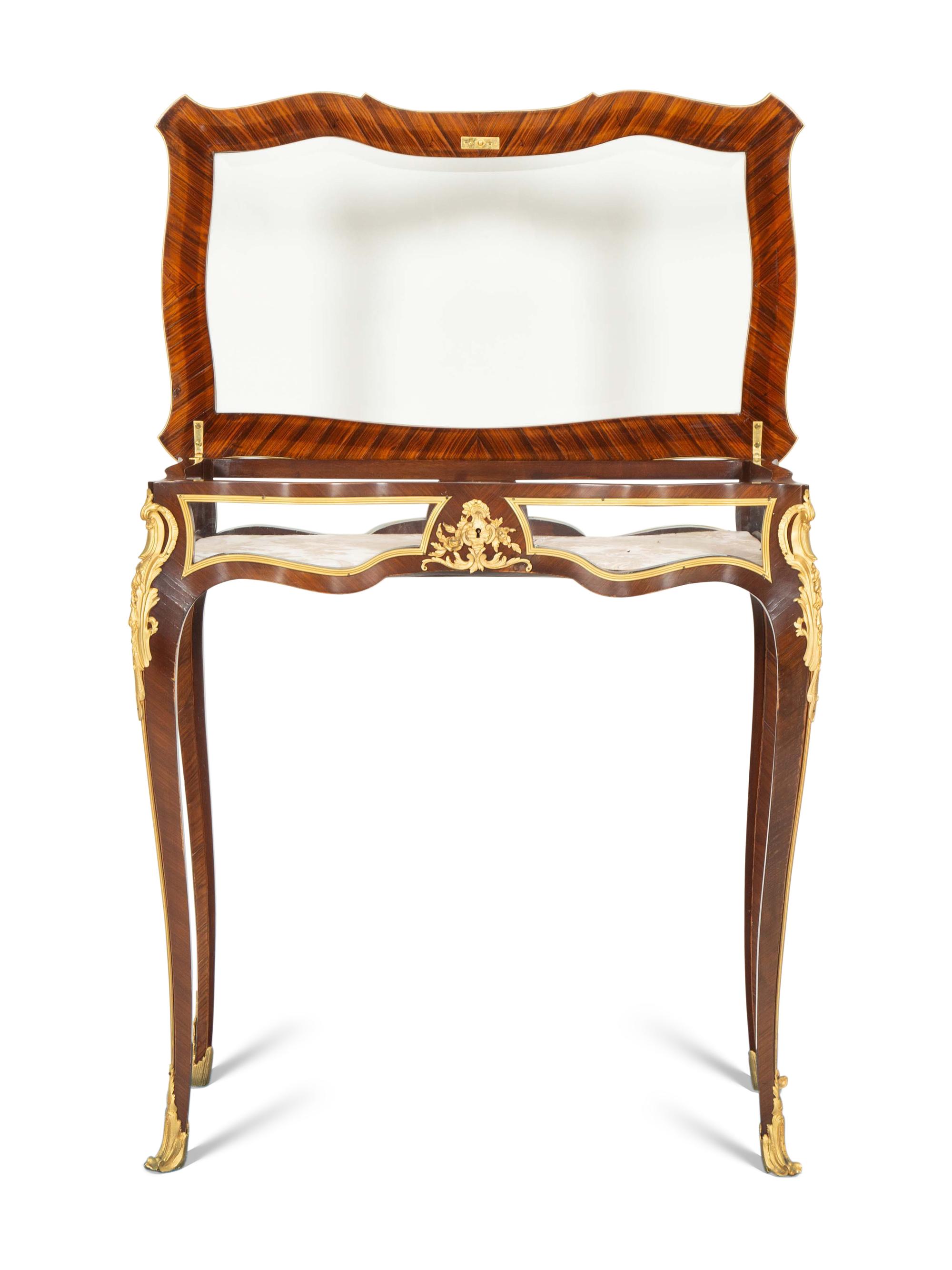 A Louis XV Style Gilt Bronze Mounted Mahogany Vitrine Table
