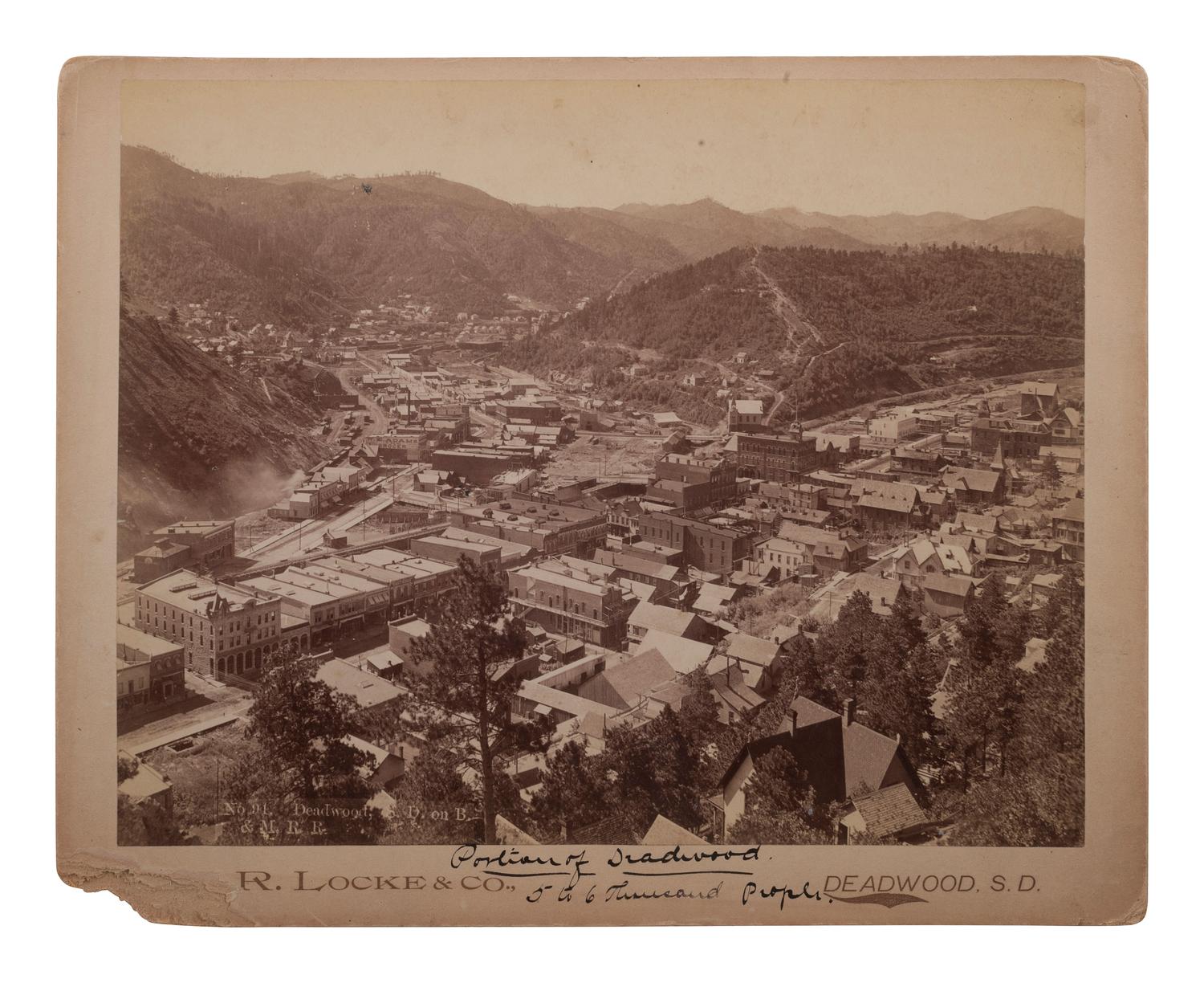 [WESTERN AMERICANA]. A group of photographs, many taken in the Western United States, highlighted by 2 photographs of Deadwood, South Dakota, taken by H.R. LOCKE.