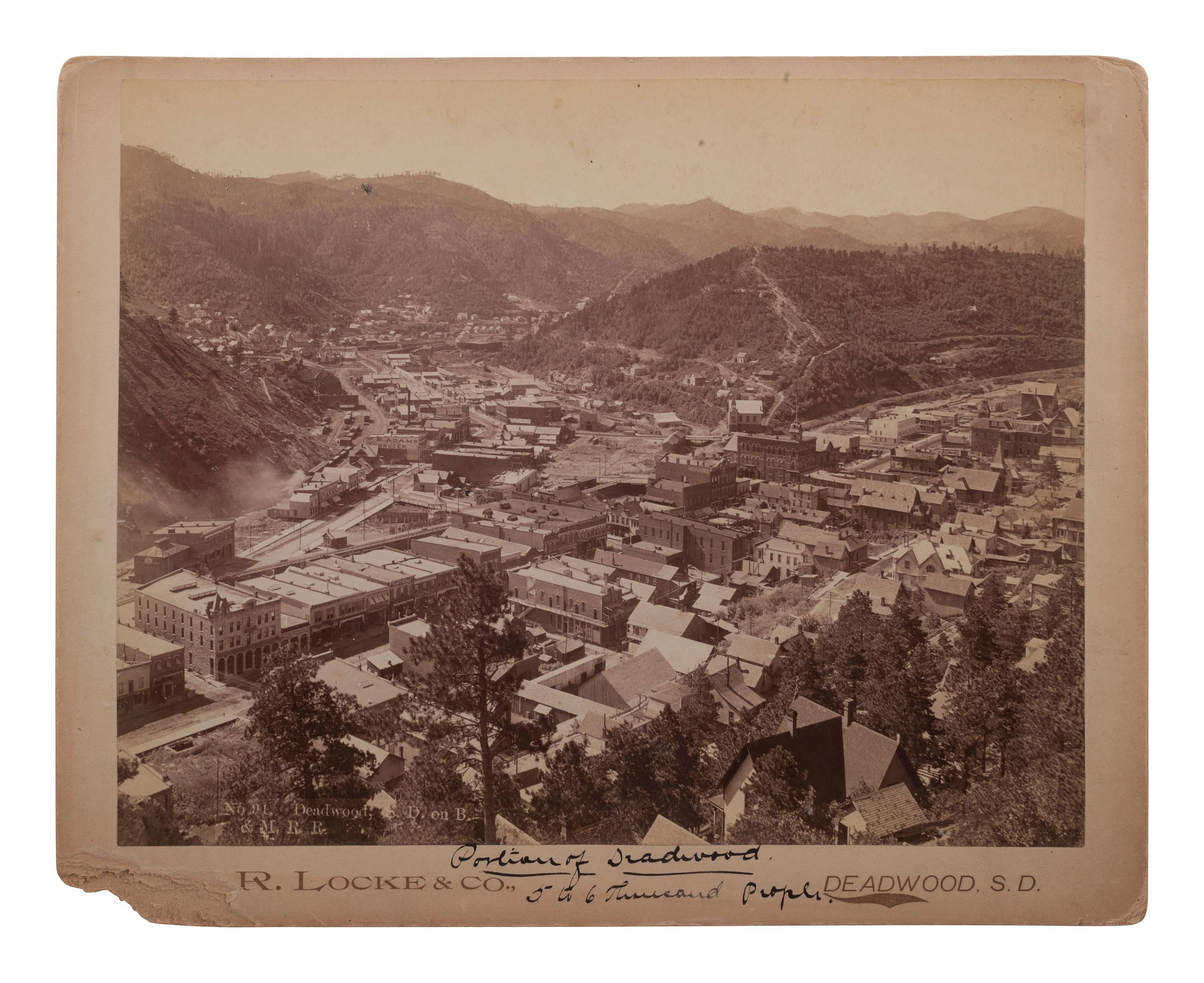 [WESTERN AMERICANA]. A group of photographs, many taken in the Western United States, highlighted by 2 photographs of Deadwood, South Dakota, taken by H.R. LOCKE.
