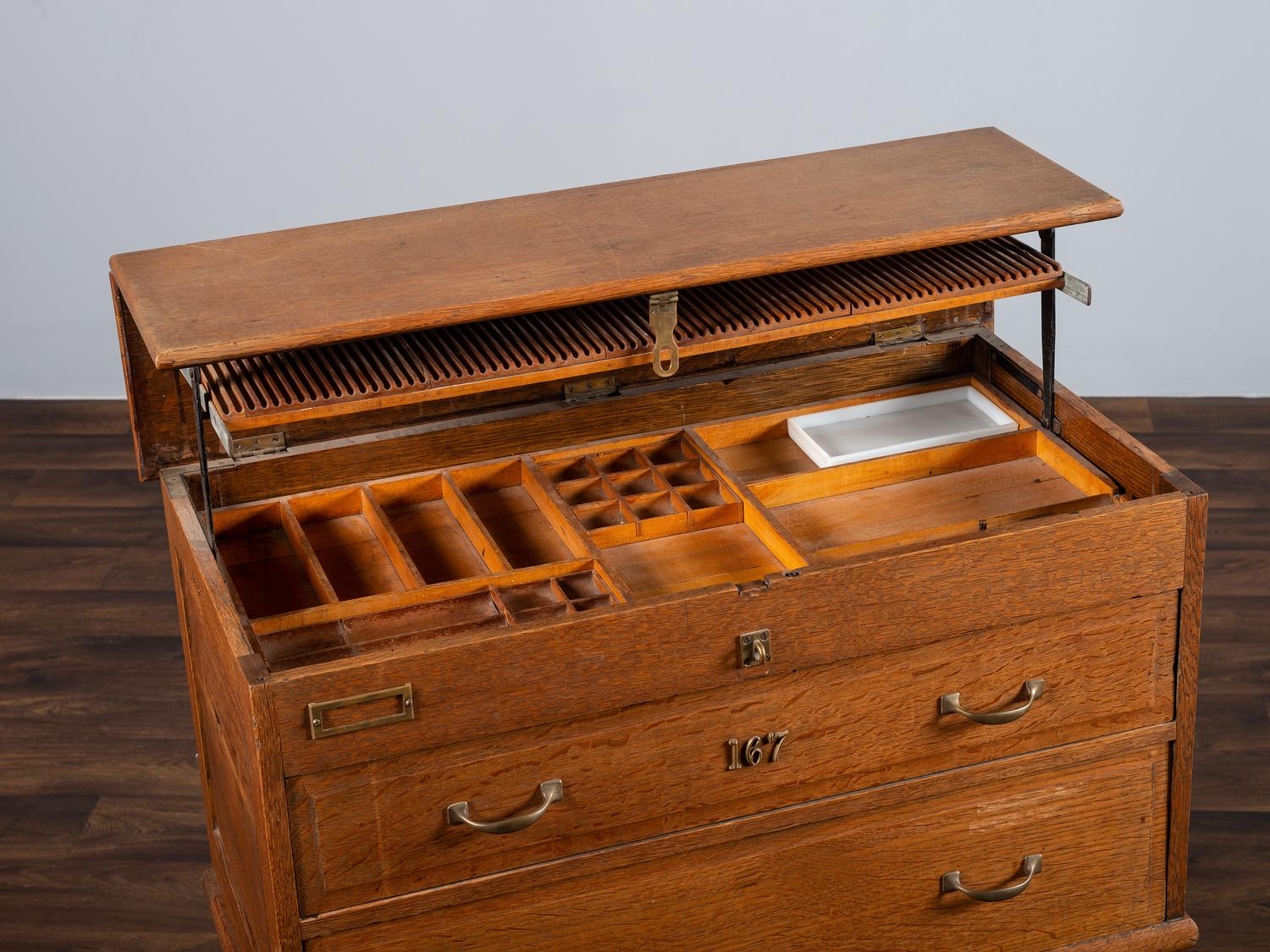 A Dental Student's Brass Mounted Oak Lift Top Cabinet