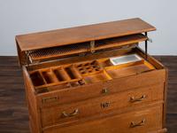 A Dental Student's Brass Mounted Oak Lift Top Cabinet