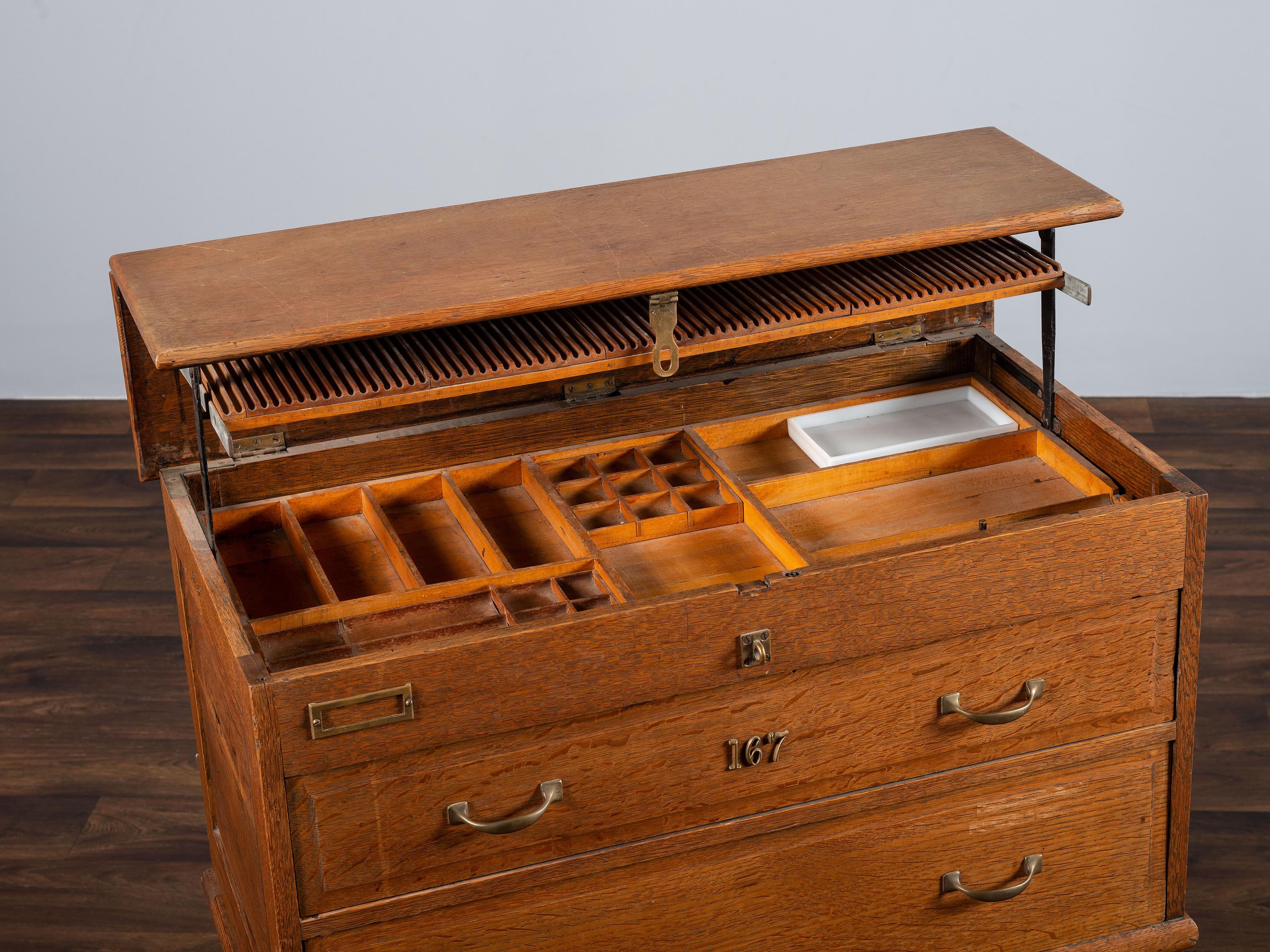 A Dental Student's Brass Mounted Oak Lift Top Cabinet