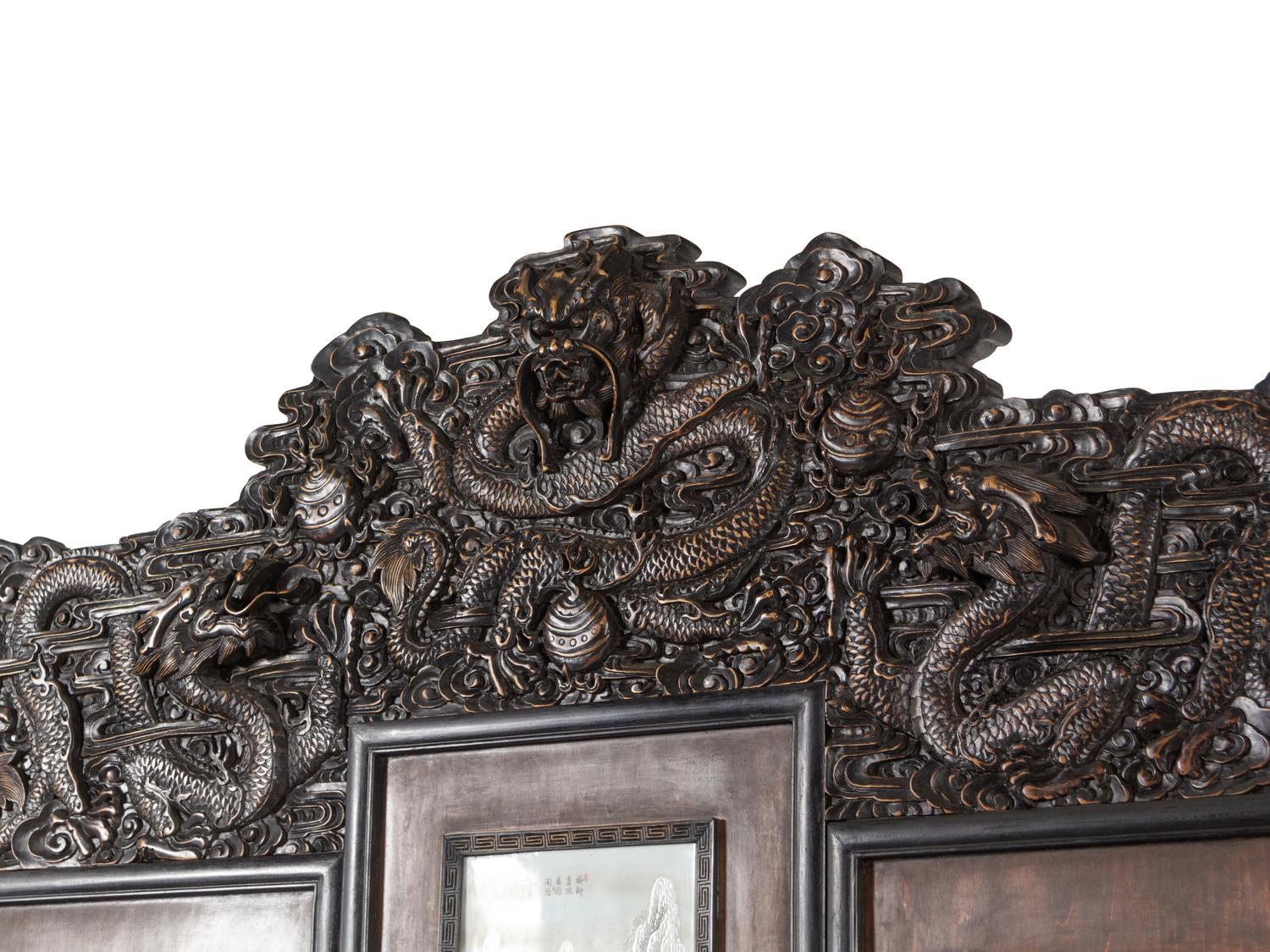 A Large Chinese Porcelain Inset Hardwood Screen