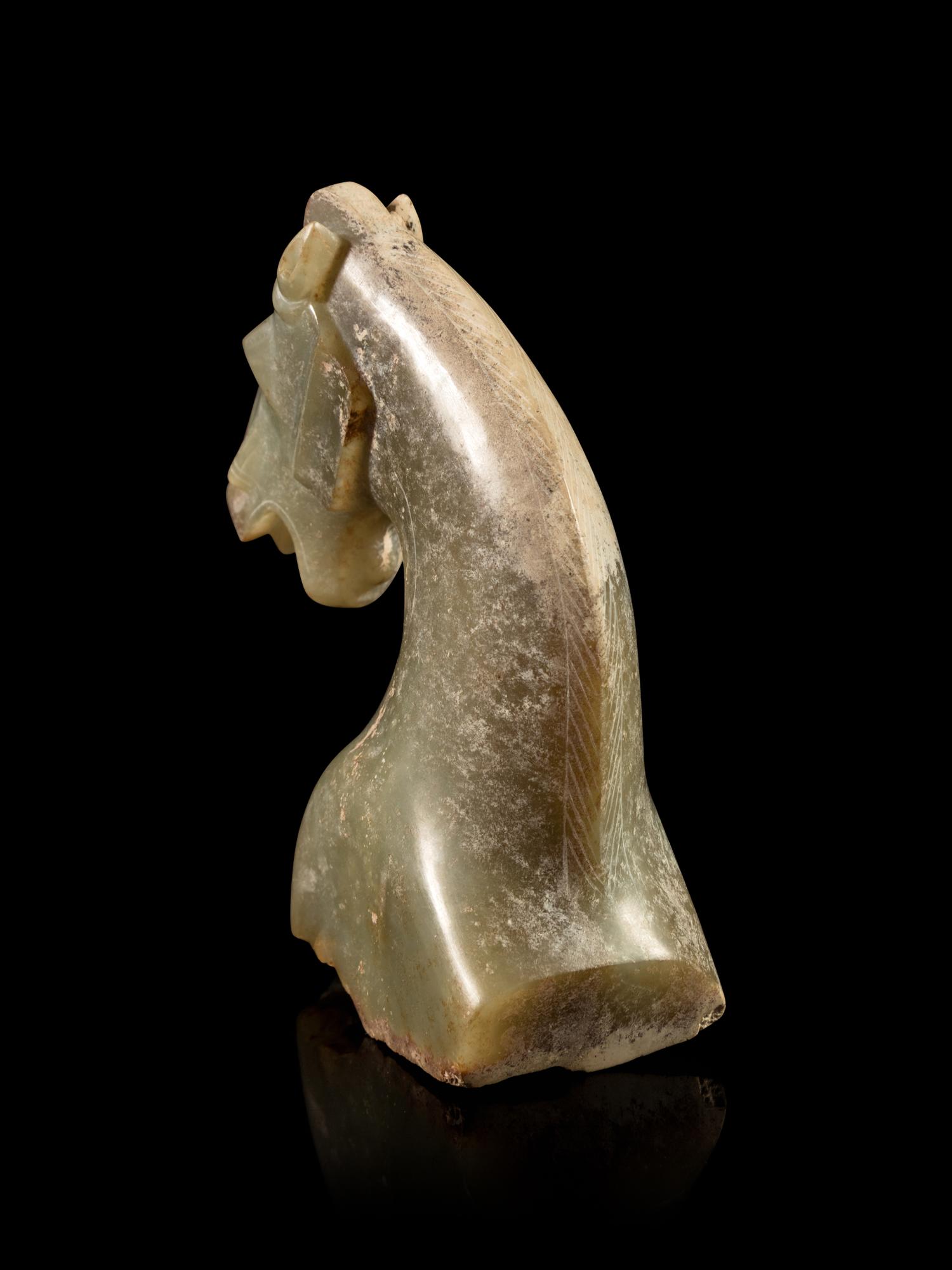 A Calcified Grey Jade Head of a Horse