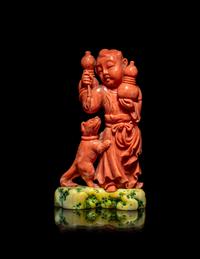 A Chinese Coral Figural Group of a Boy and a Dog